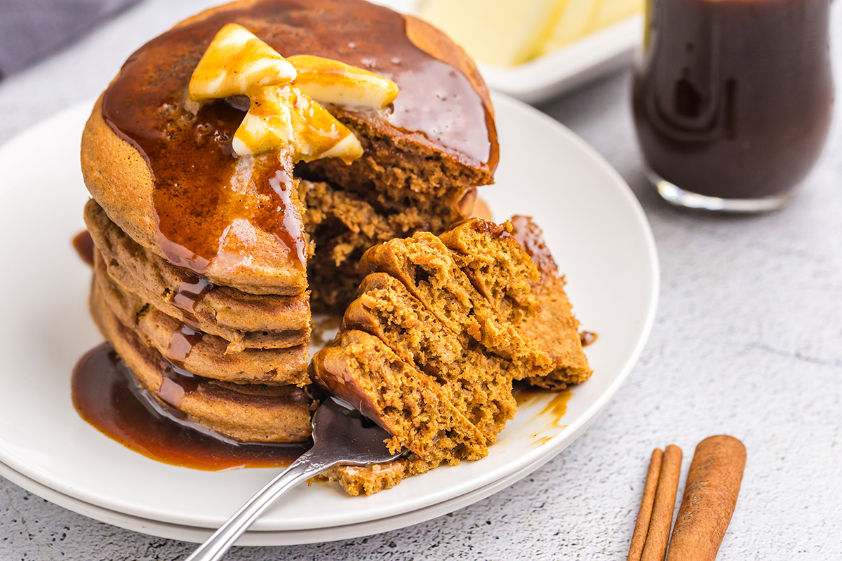 bite taken out of stack of gingerbread pancakes