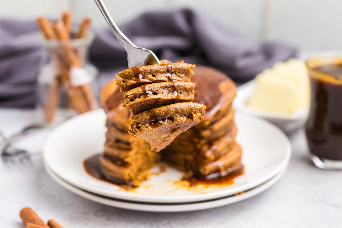 close up of bite of gingerbread pancakes on fork