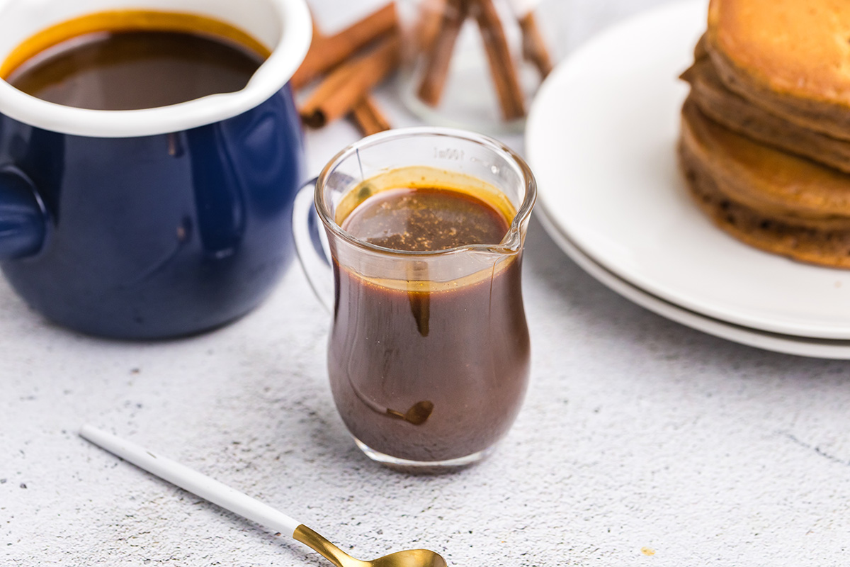 angled shot of gingerbread syrup in jar