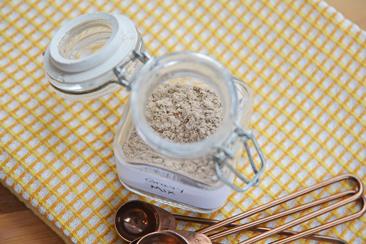 overhead shot of brown gravy mix in jar