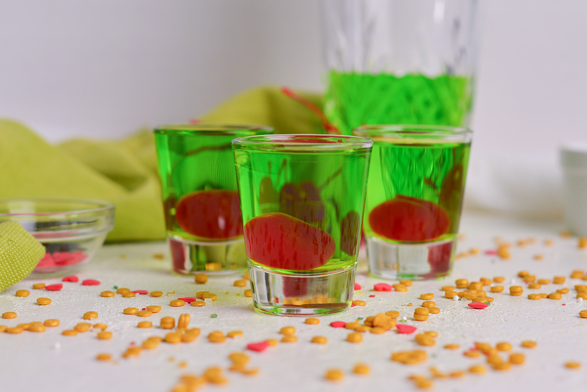 straight on shot of three grinch shots with cherries