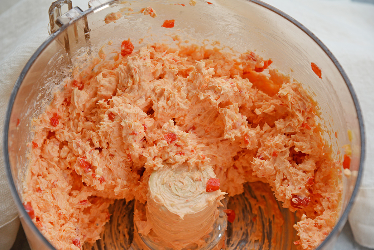 angled shot of pimento cheese in food processor