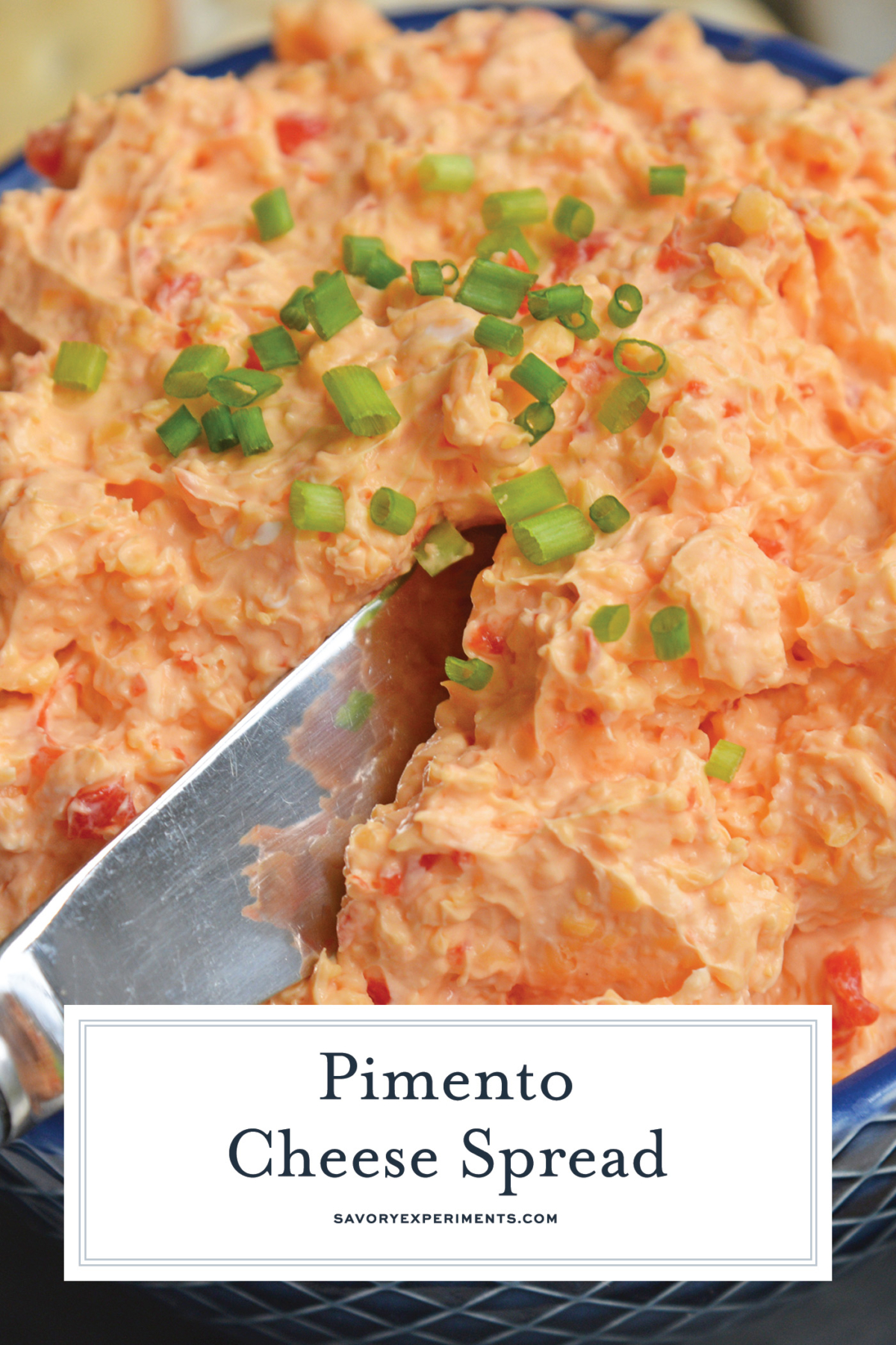 angled shot of knife in bowl of pimento cheese with text overlay