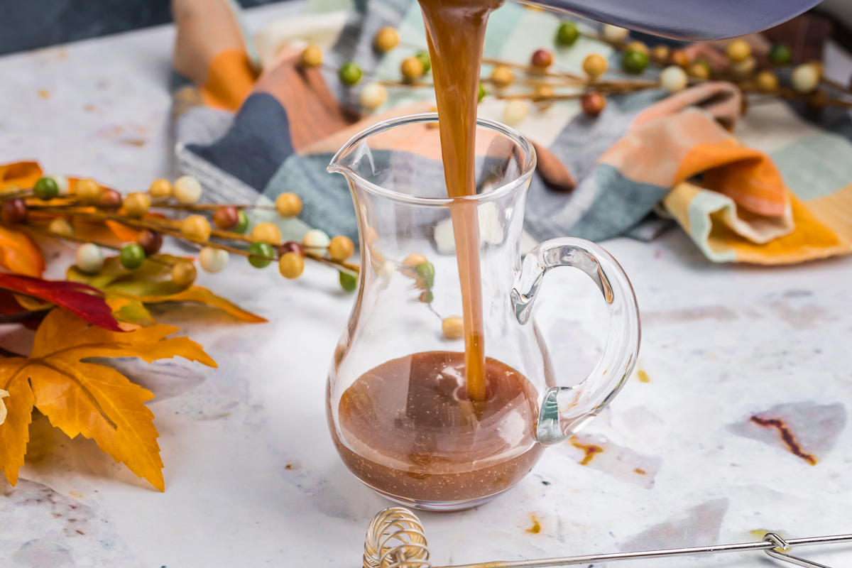 pumpkin syrup pouring into jar