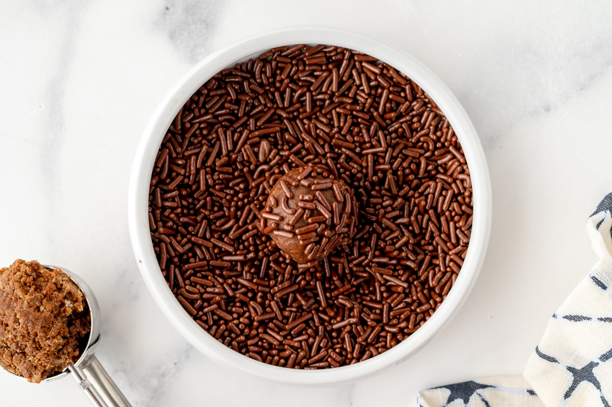 chocolate ball in bowl of chocolate sprinkles