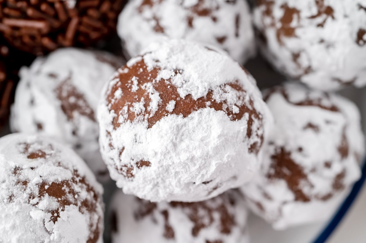 close up of rum ball coated in powdered sugar