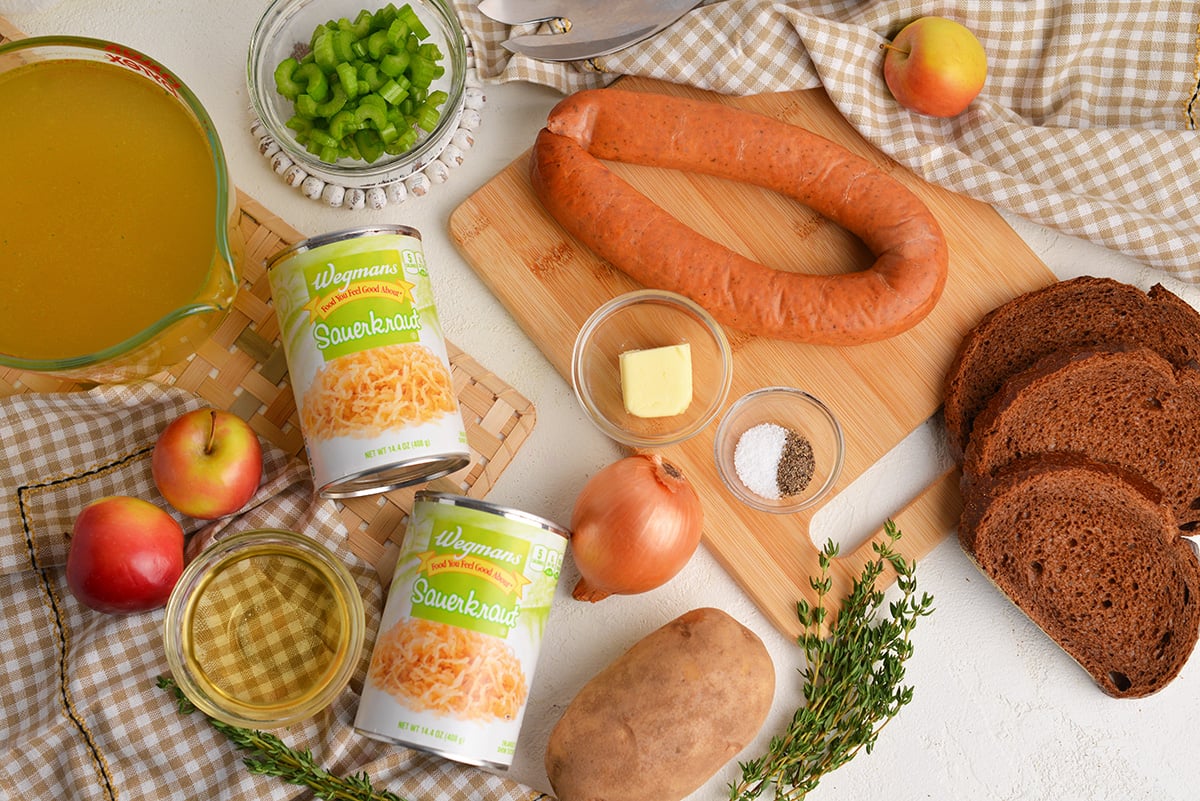 overhead shot of sausage and sauerkraut soup ingredients