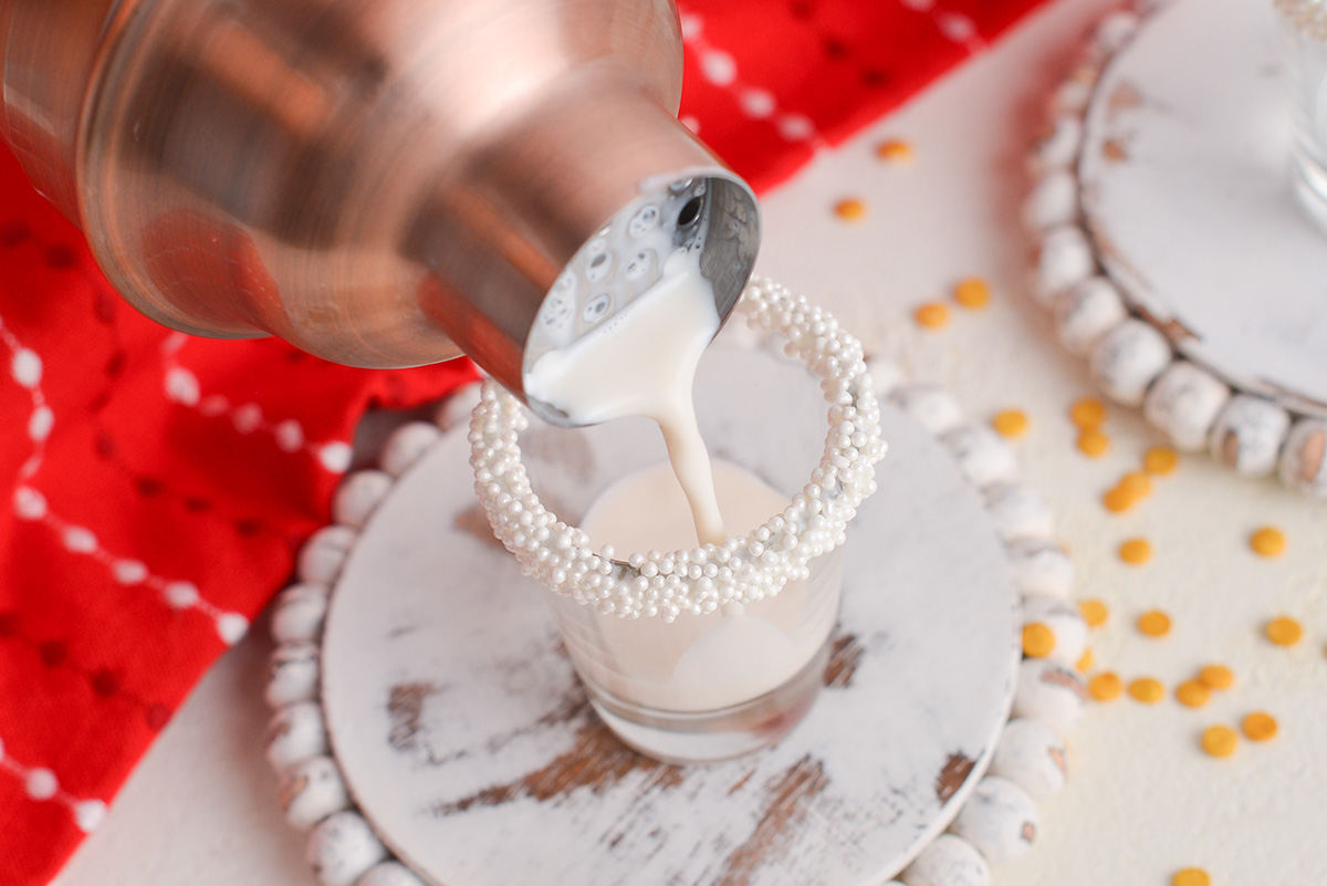 creamy shot pouring into shot glass