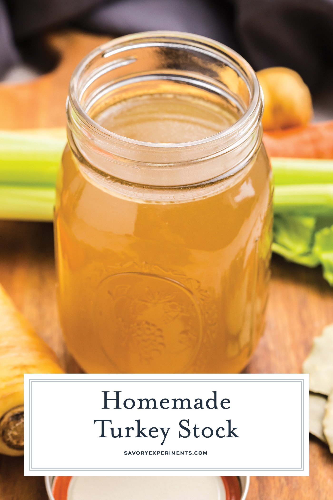 angled shot of mason jar of turkey stock with text overlay