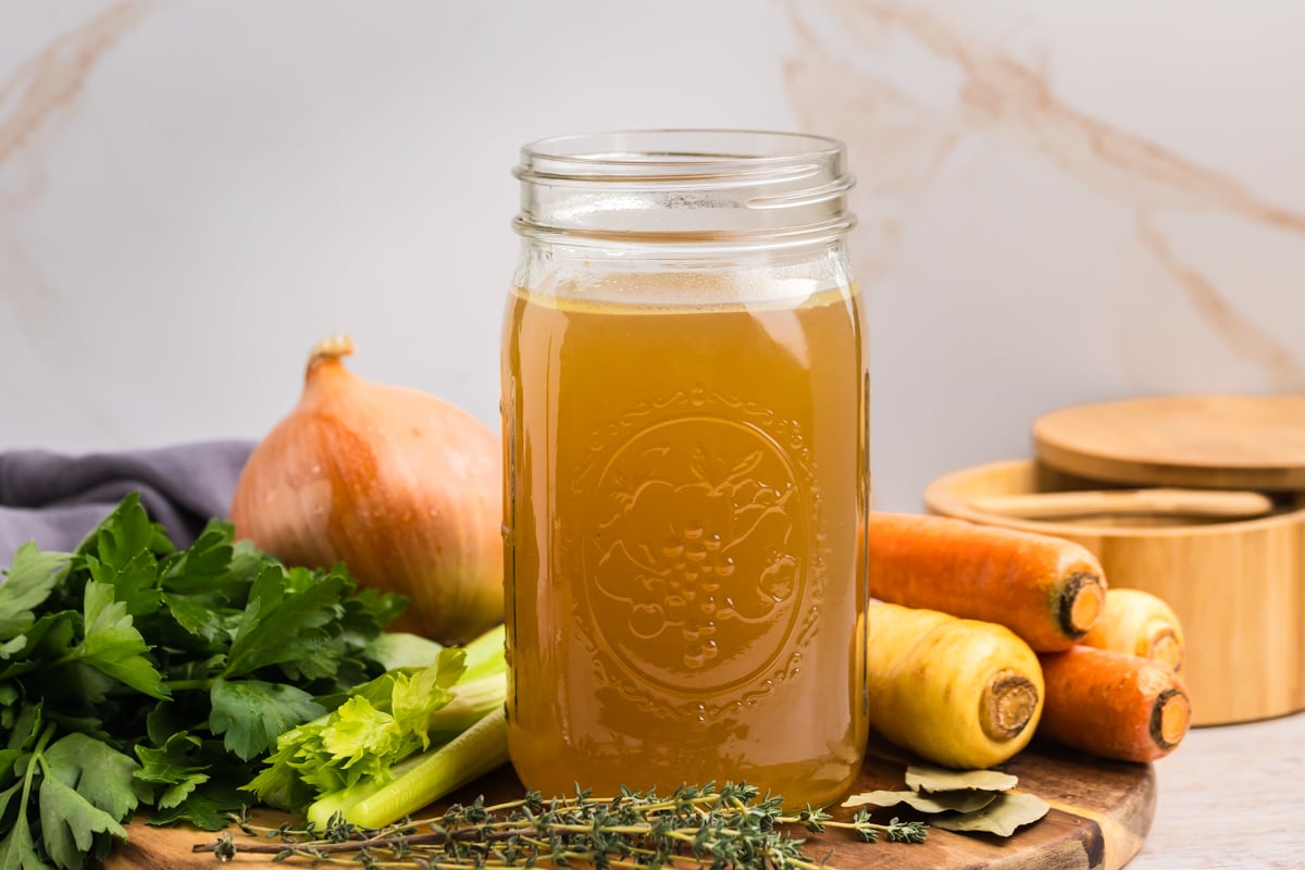 straight on shot of mason jar of turkey stock