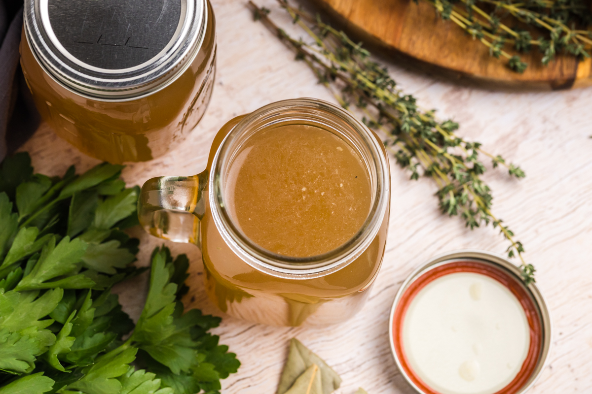 overhead shot of jar of turkey stock