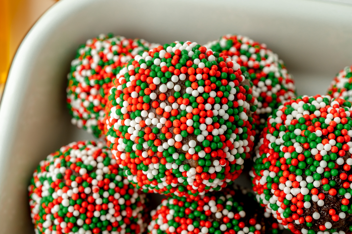 close up shot of fireball chocolate truffles coated in sprinkles