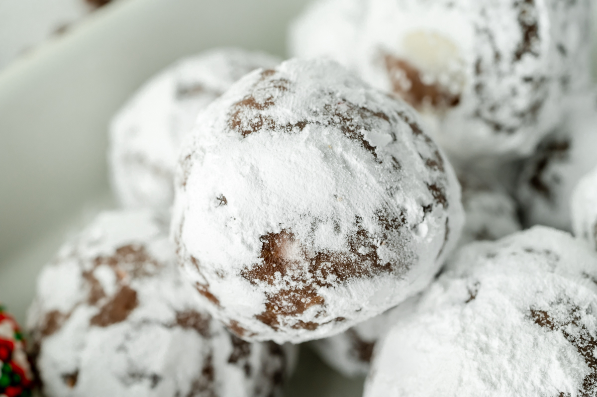 close up shot of fireball chocolate truffles coated in powdered sugar