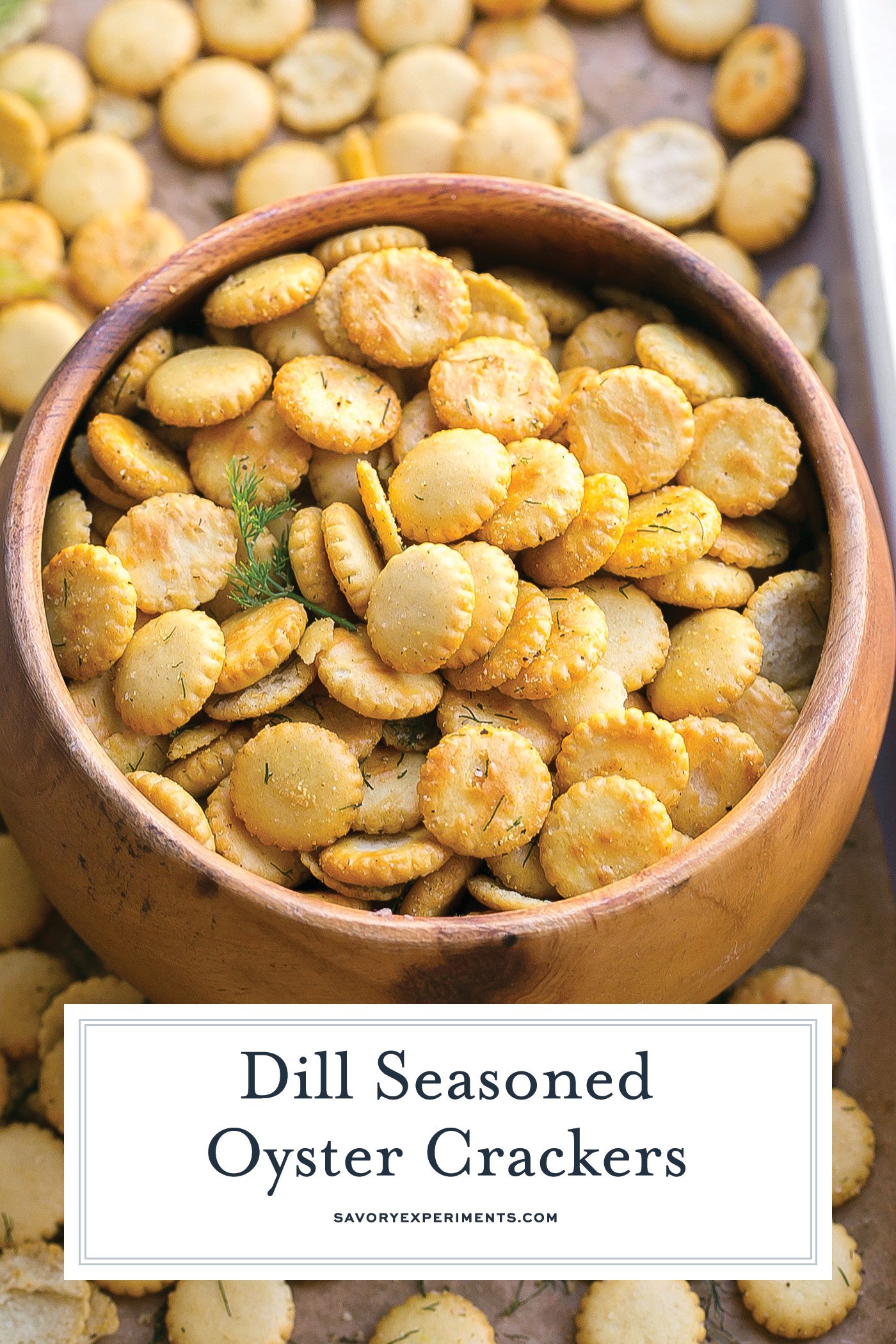 angled shot of bowl of dill oyster crackers with text overlay