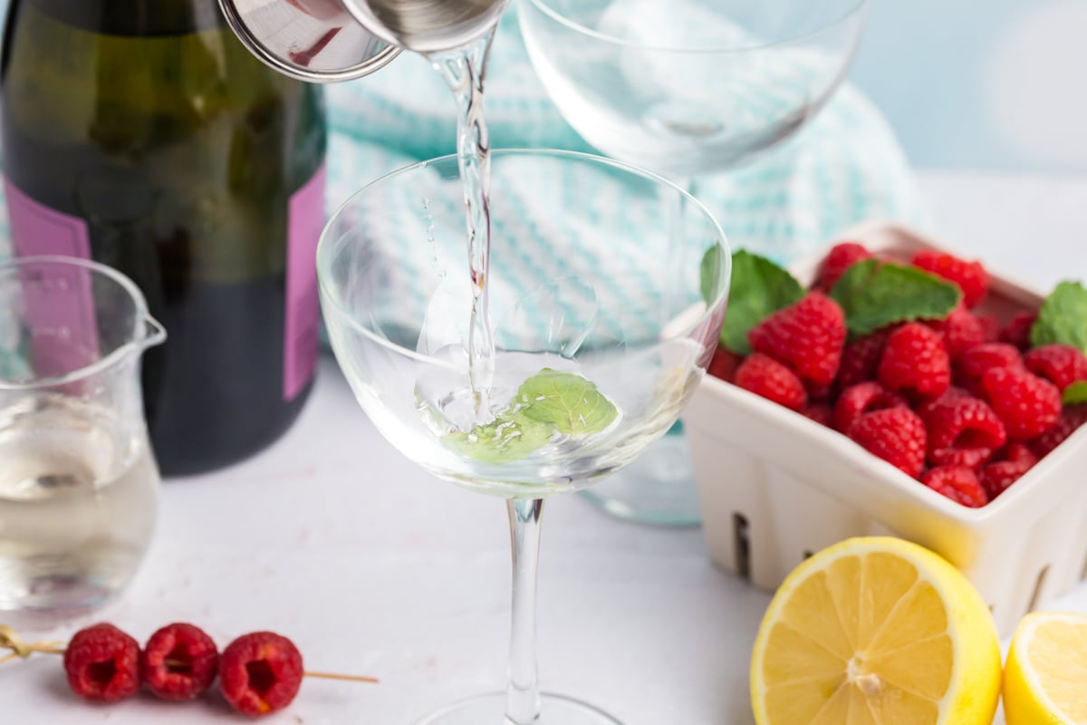 elderflower liqueur poured into glass