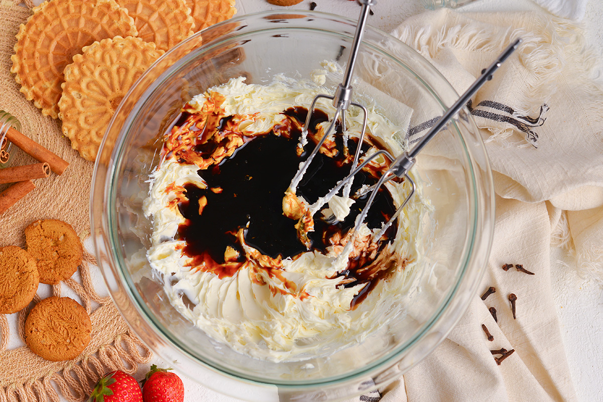 molasses and cream cheese in mixing bowl