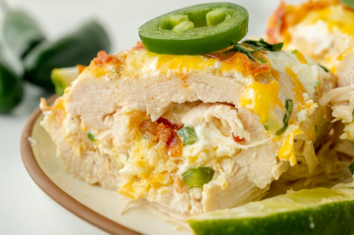 close up of stuffed chicken breast cut in half