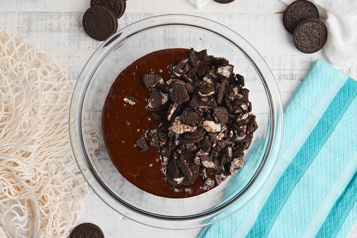 overhead shot of oreos added to brownie batter