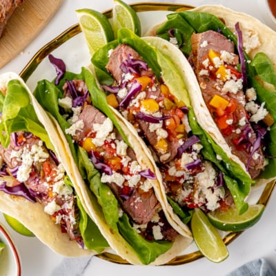 overhead shot of platter of steak tacos