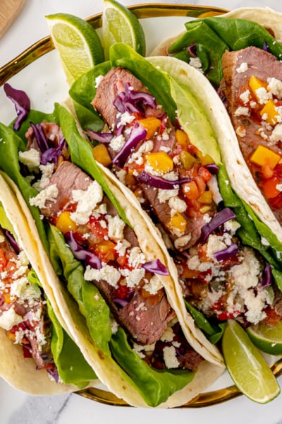 overhead shot of platter of steak tacos