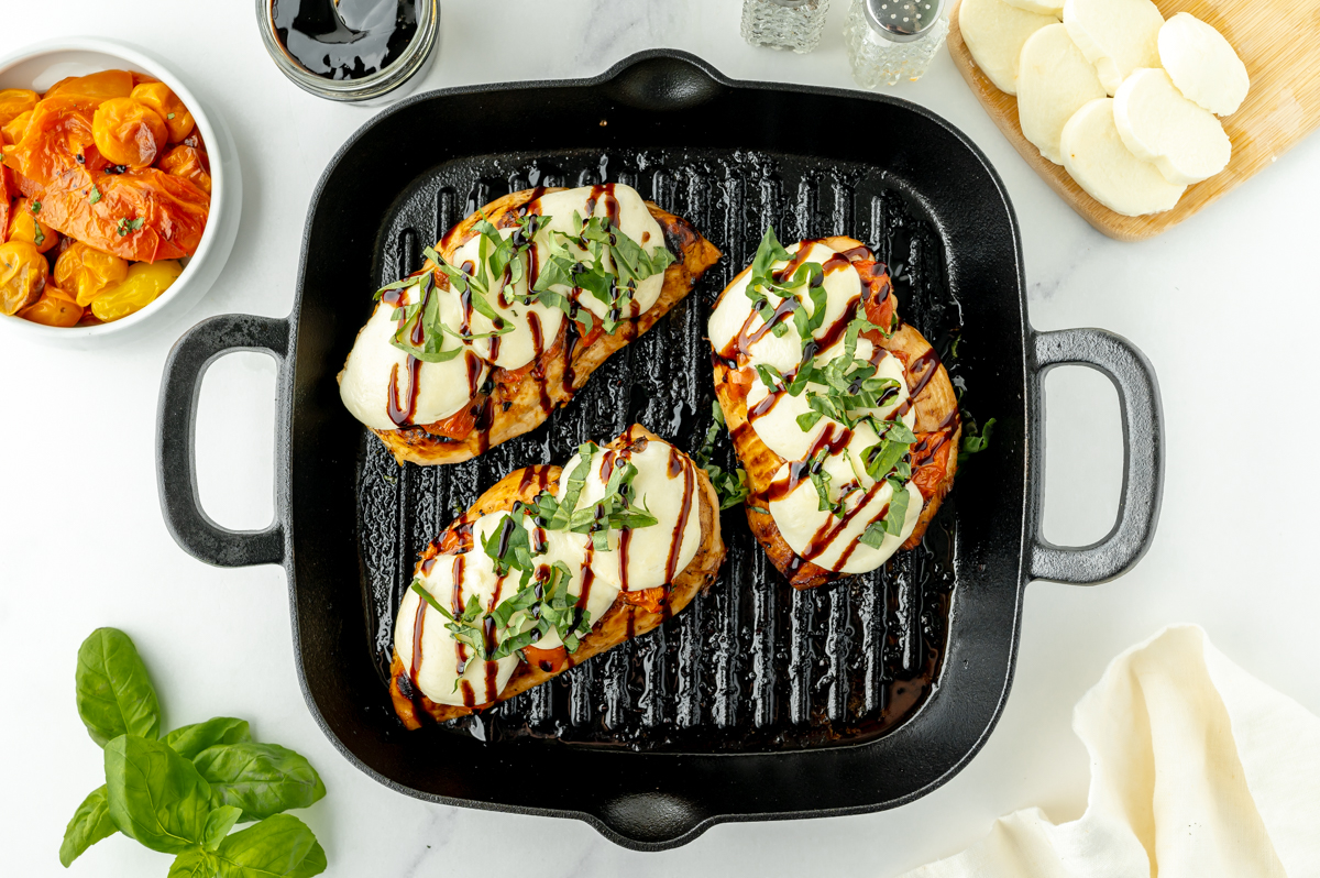 overhead shot of skillet of caprese chicken