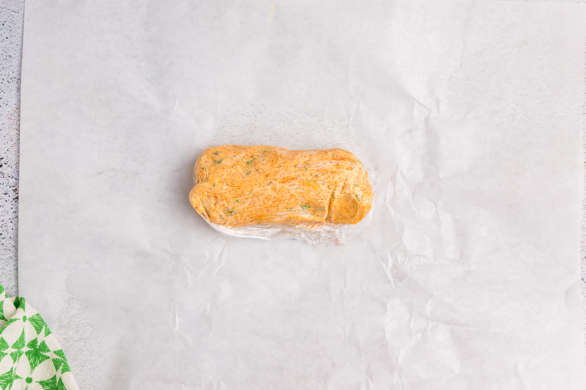 overhead shot of log of cowboy butter wrapped in plastic wrap