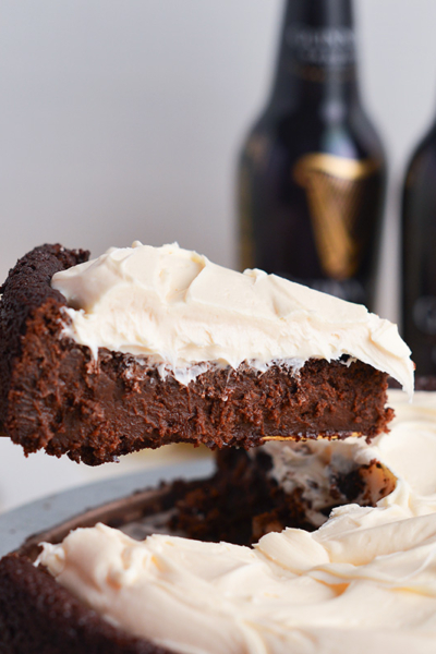 slice taken out of flourless guinness cake