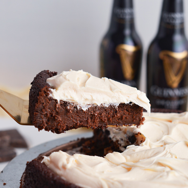 slice taken out of flourless guinness cake