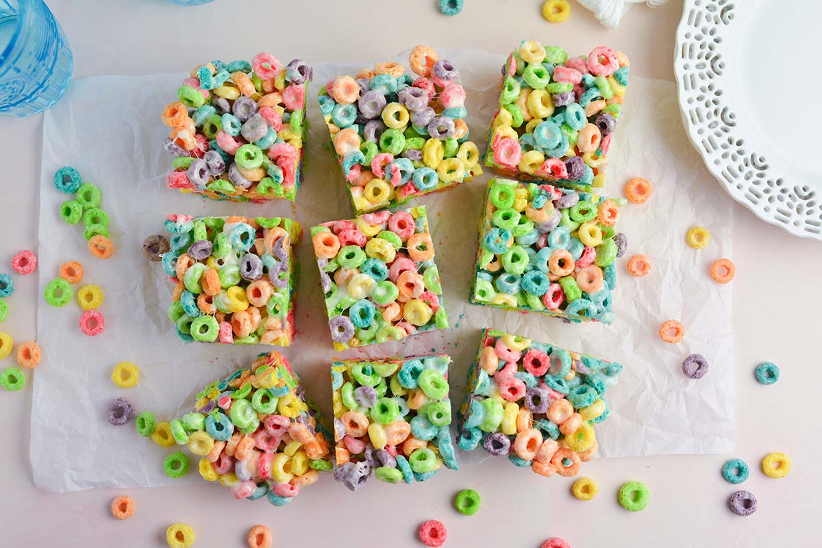 overhead shot of fruit loop treats cut on parchment paper