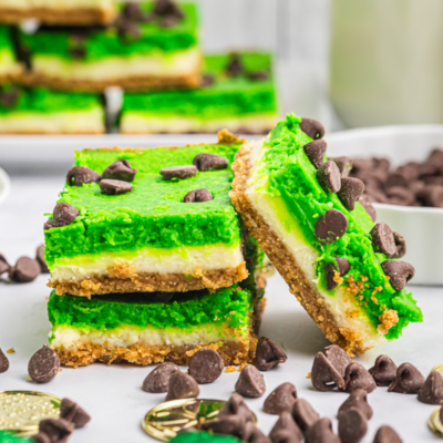 close up of stack of cheesecake bars