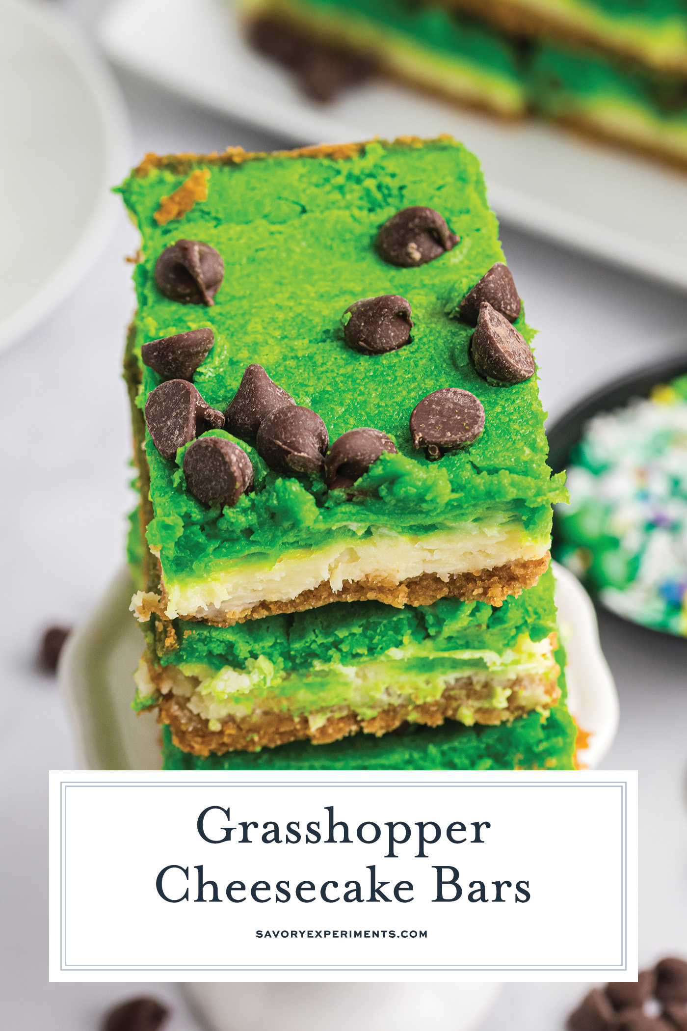 angled shot of stack of grasshopper cheesecake bars with text overlay