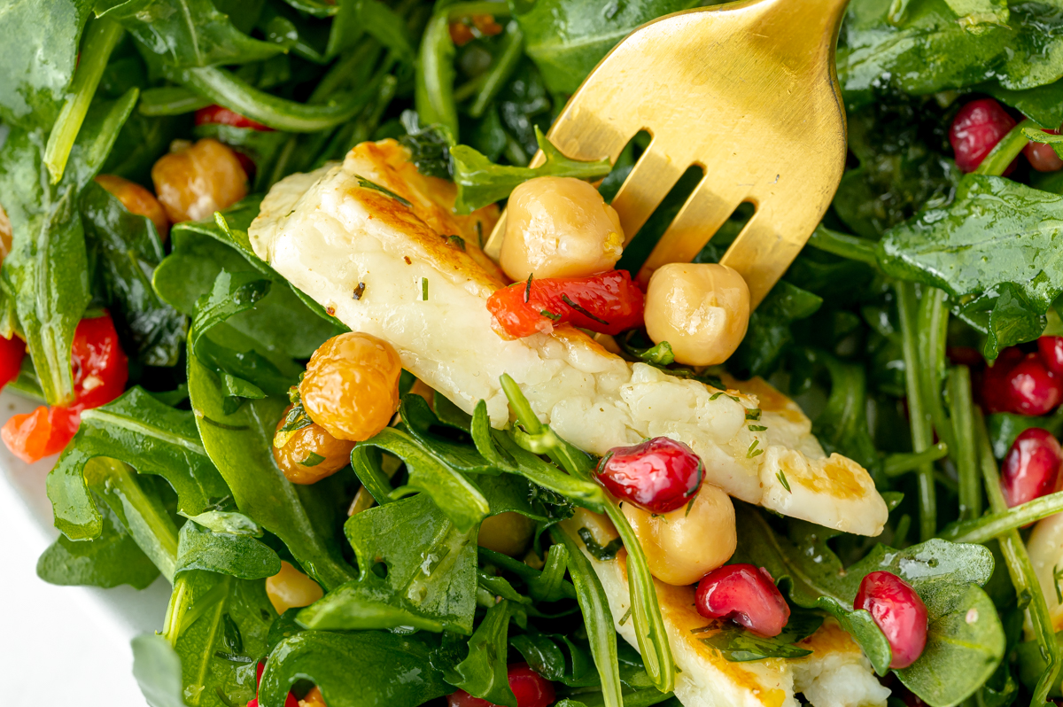 bite of fried halloumi salad on fork