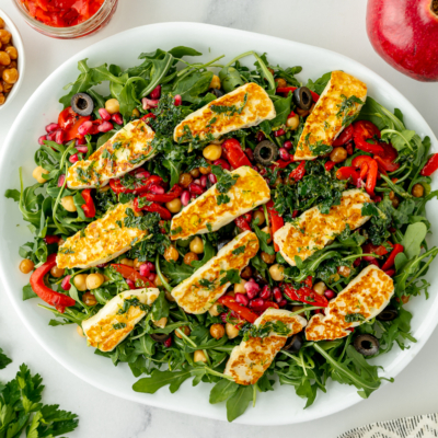 overhead shot of fried halloumi salad on platter