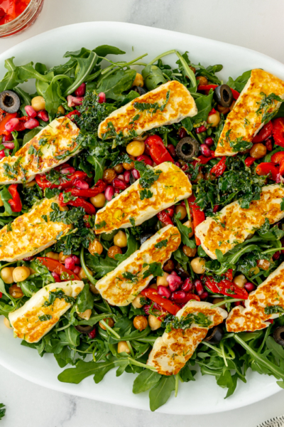 overhead shot of fried halloumi salad on platter