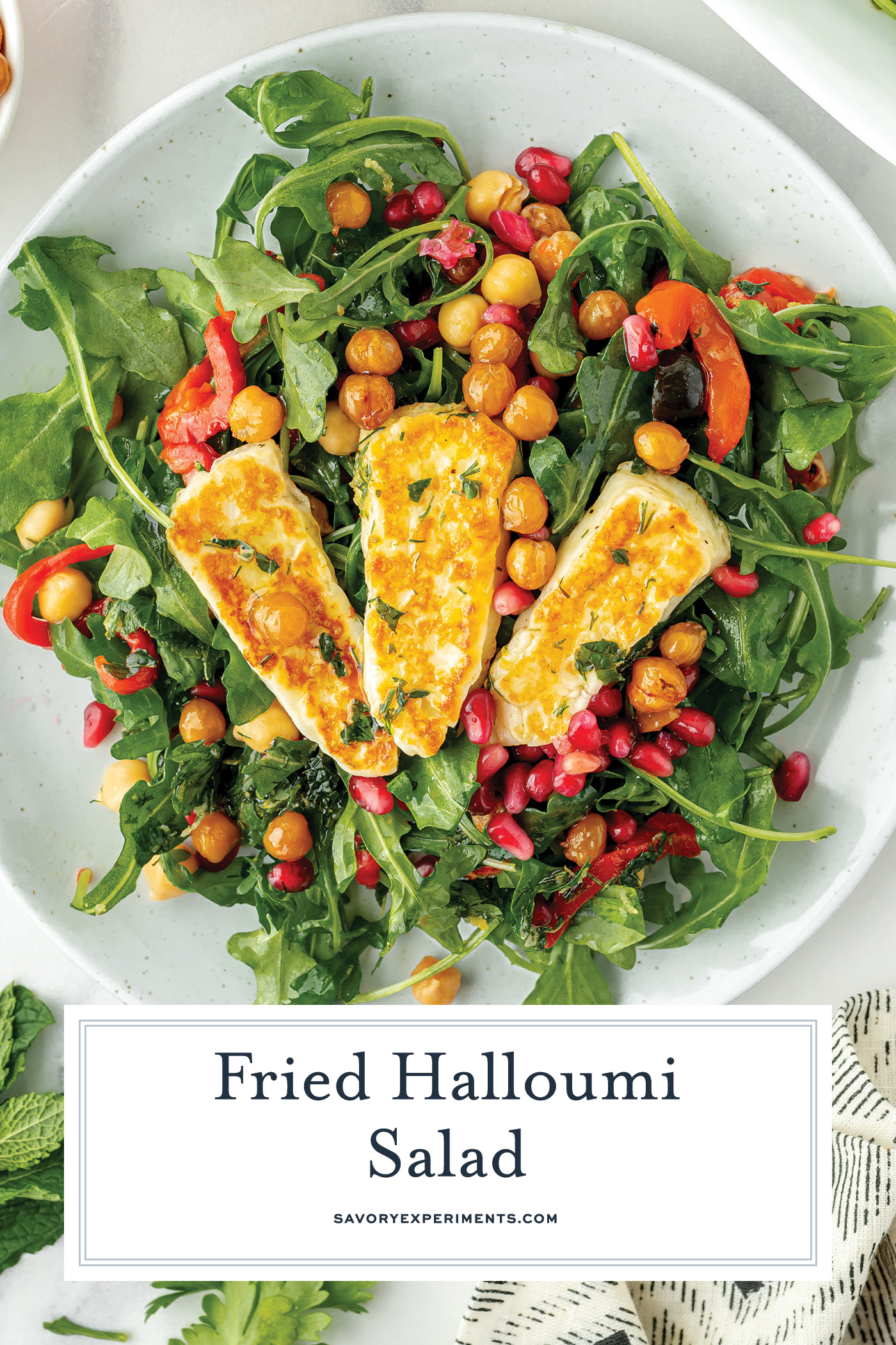 overhead shot of plate of fried halloumi salad with text overlay