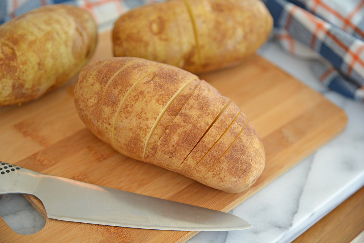 russet potato sliced on cutting board