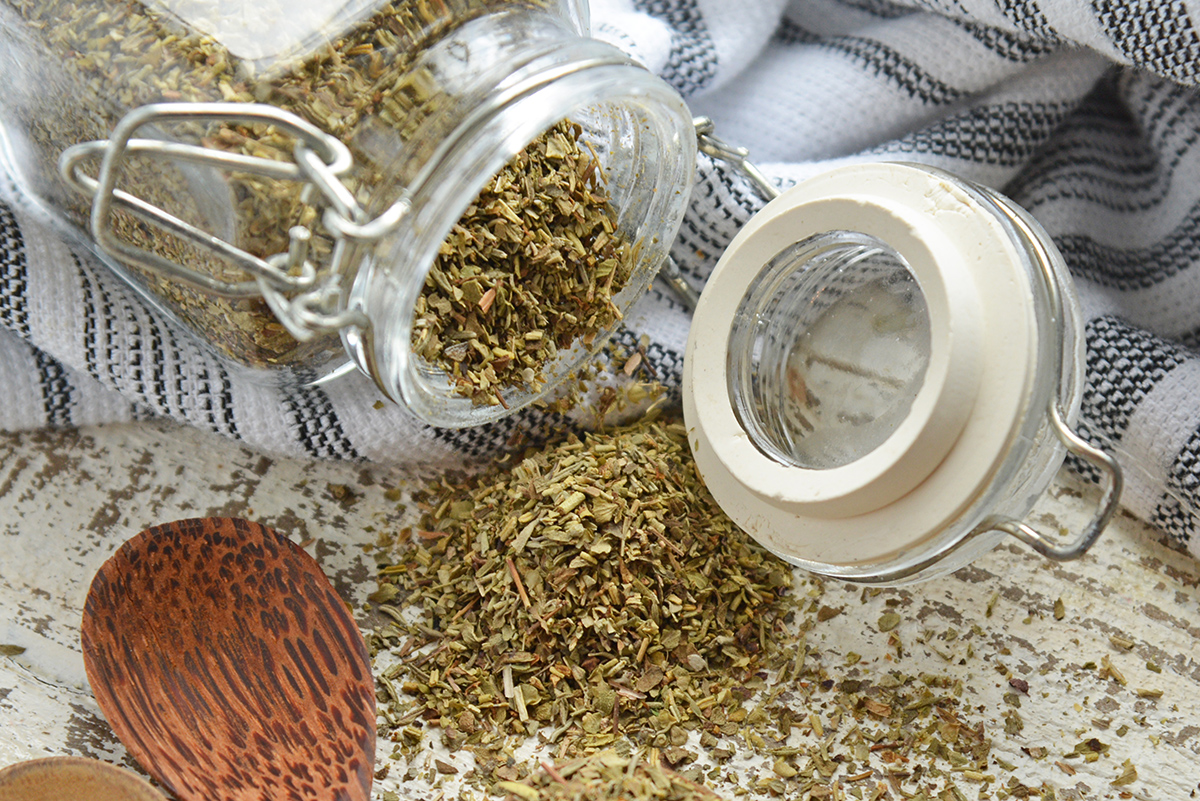 italian seasoning pouring out of spice container