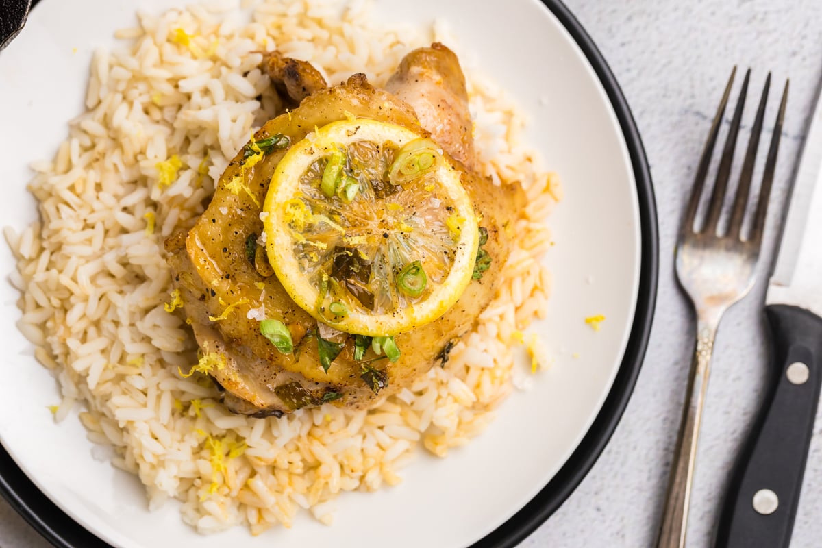 close up overhead shot of honey lemon garlic chicken over rice