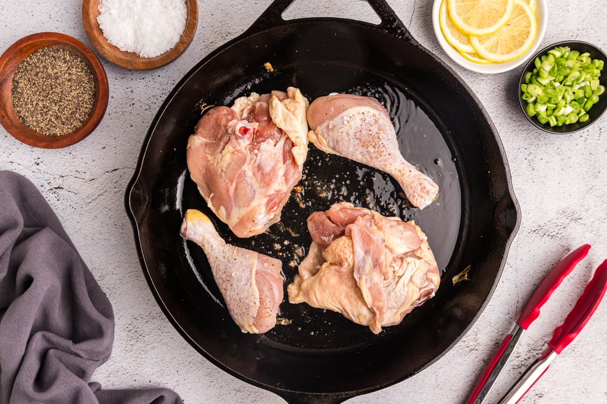 chicken cooking in skillet