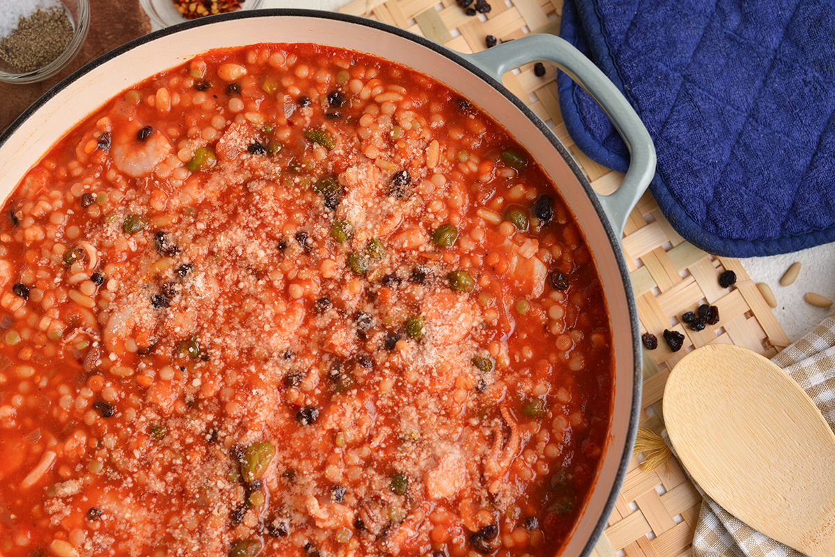 close up overhead shot of pot of italian seafood stew