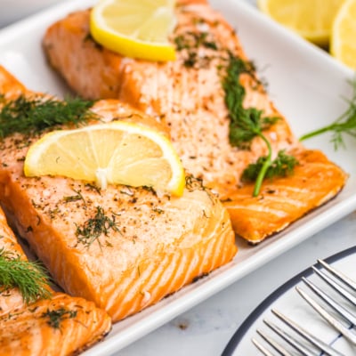 angled shot of lemon dill salmon on serving tray