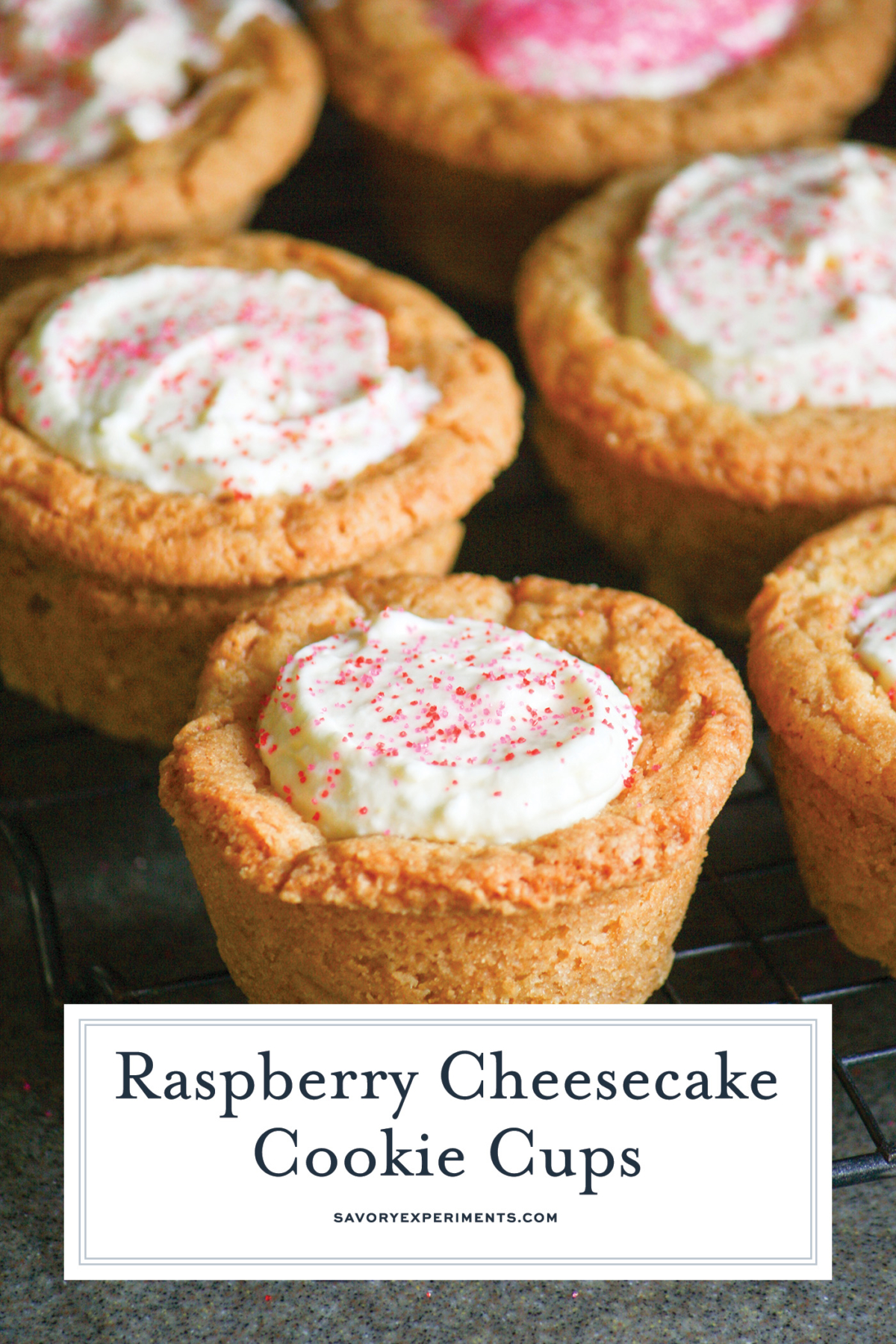 angled shot of raspberry cheesecake cookie cups with text overlay