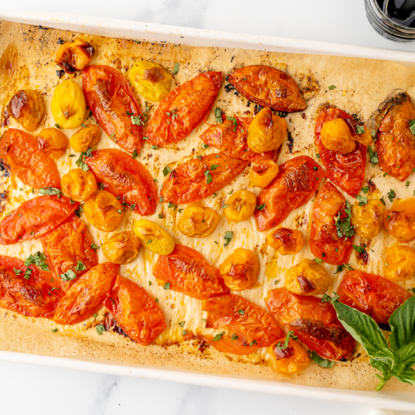 overhead shot of sheet pan of roasted tomatoes