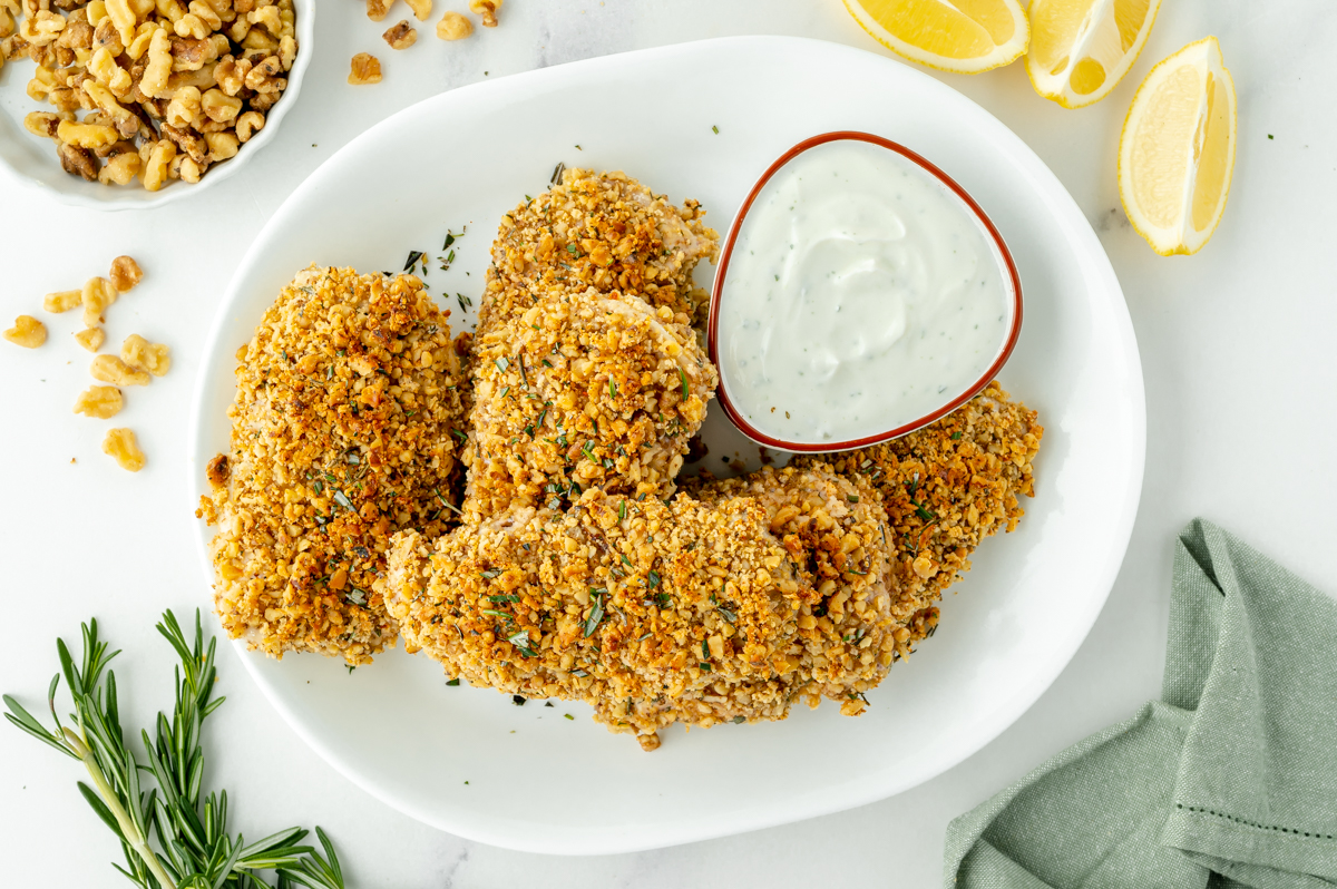 overhead shot of platter of walnut crusted chicken