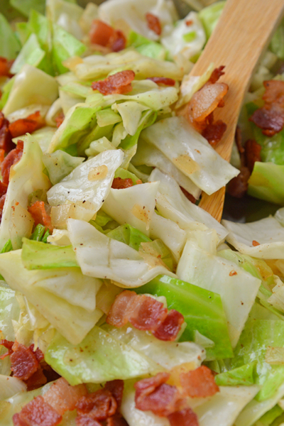 Fried Cabbage with bacon in skillet