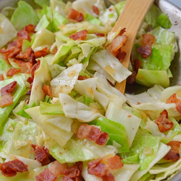 Fried Cabbage with bacon in skillet