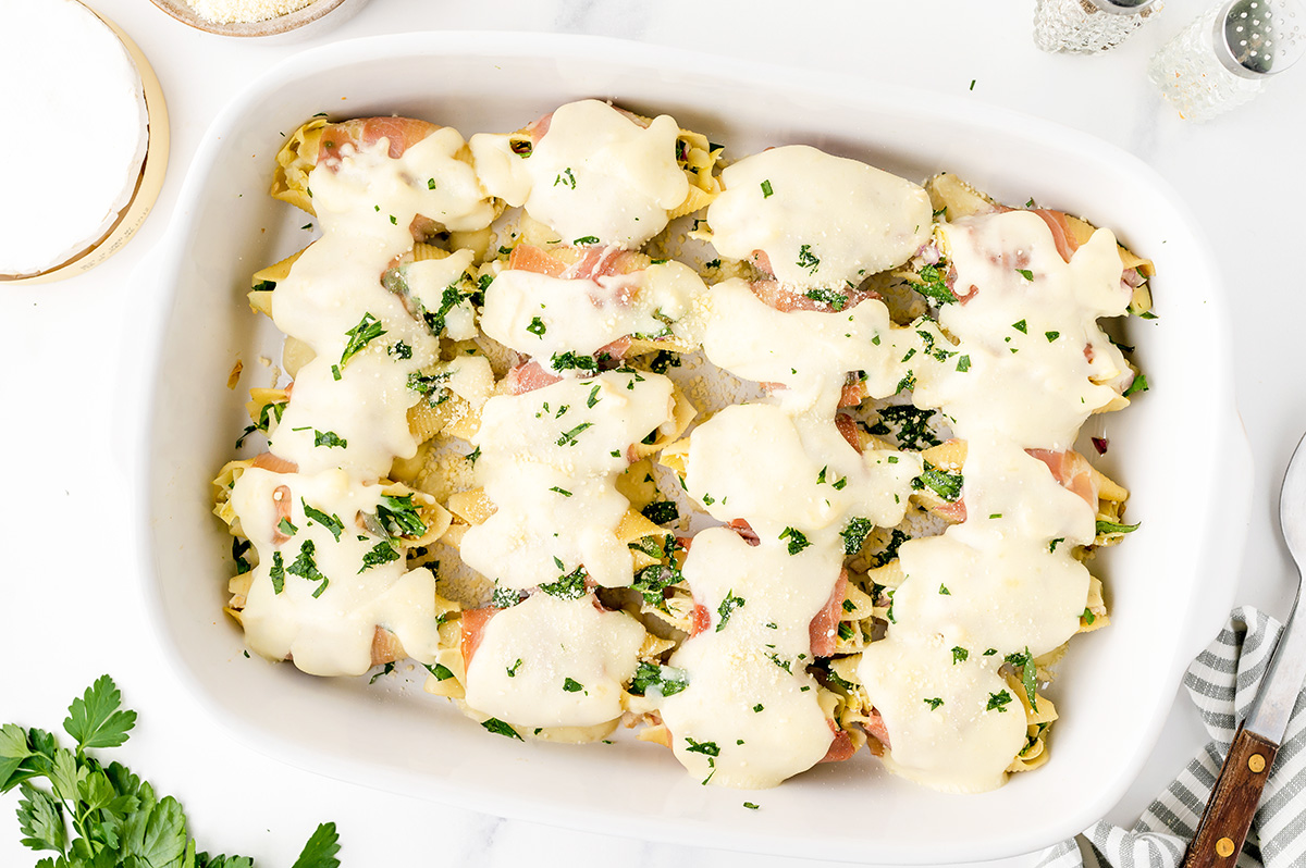 overhead shot of chicken stuffed shells in baking dish