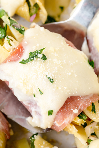 overhead shot of chicken stuffed shell on serving spoon