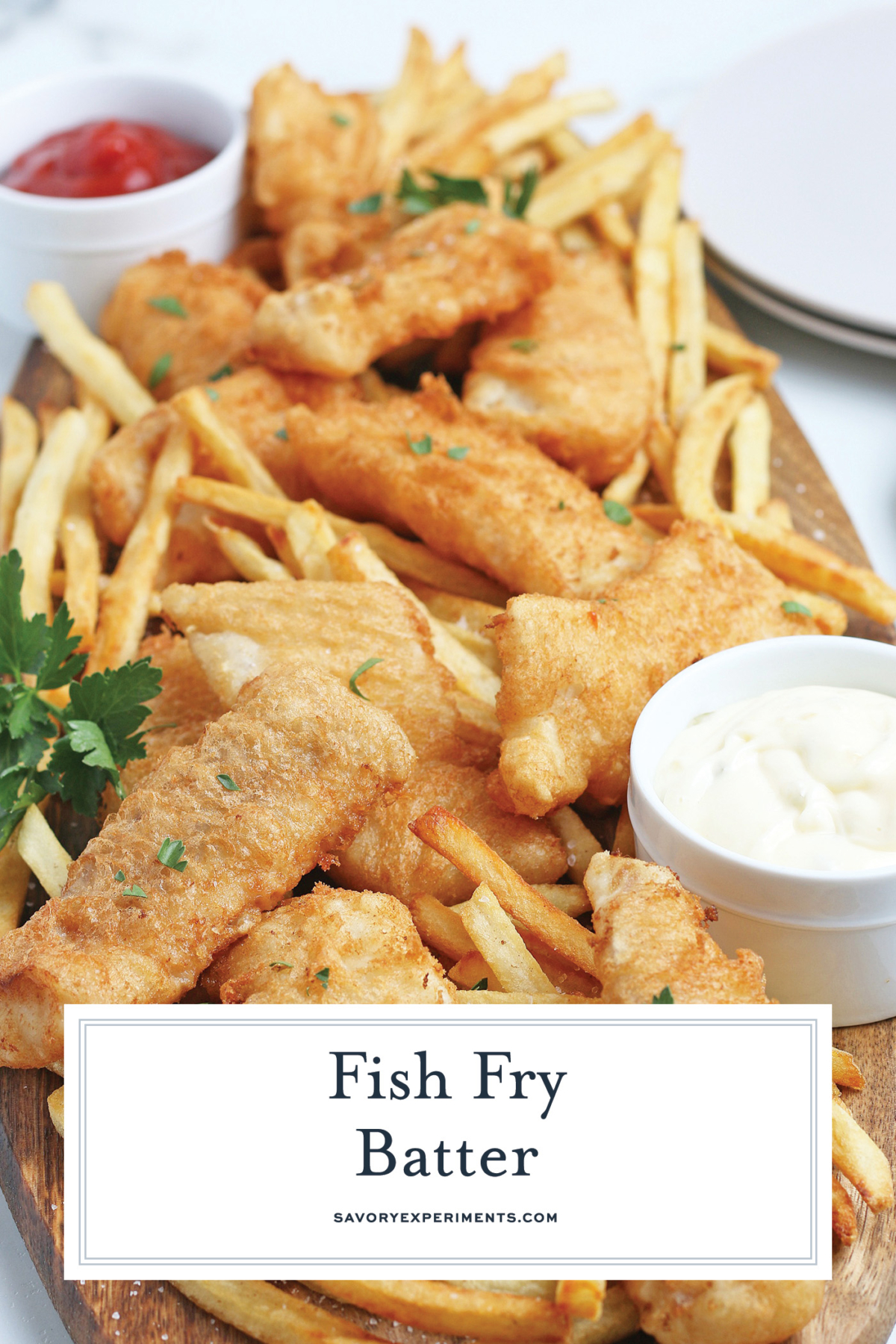 angled shot of platter of fried fish with text overlay