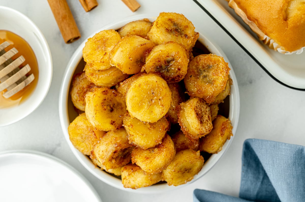 overhead shot of bowl of fried bananas